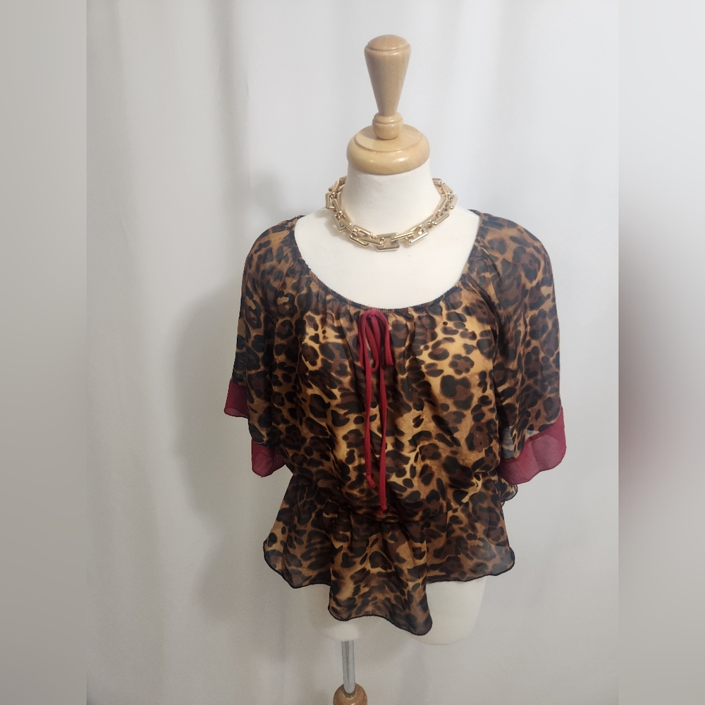 Animal Print Peplum Top Size Medium Short Sleeves Circle Neck